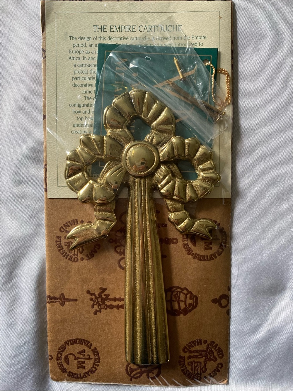 Vintage Virginia Metal Crafters solid brass "Empire Cartouche" wall Decor.
